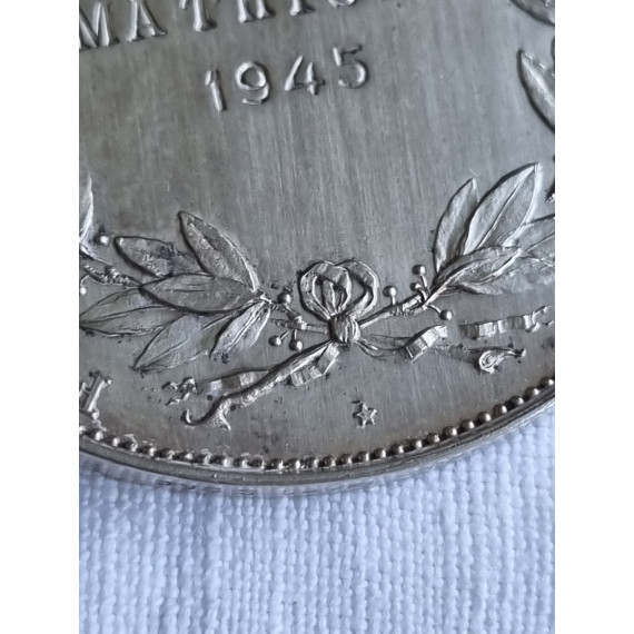 Fortjeneste medalje i sølv fra 1945, for lang og tro tjeneste