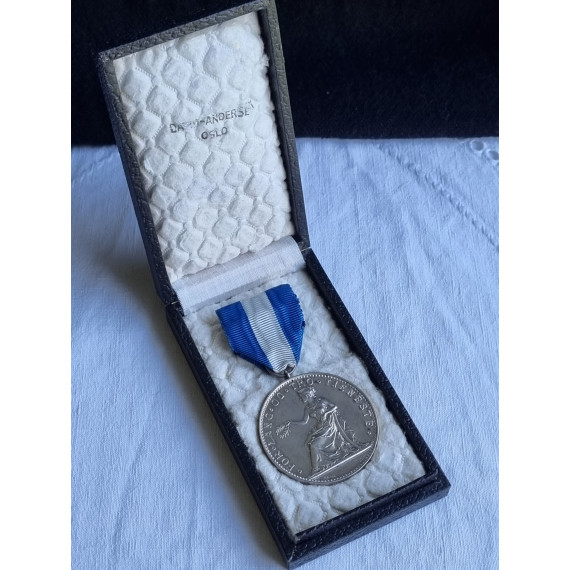 Fortjeneste medalje i sølv fra 1945, for lang og tro tjeneste