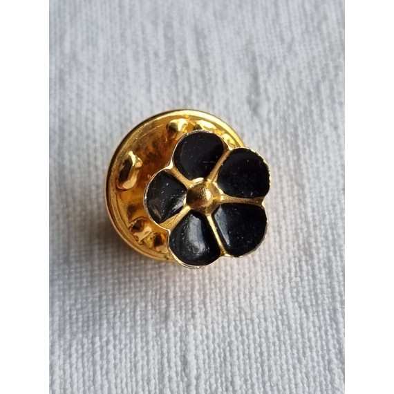 Vintage metal city selskaps pin, sort emalje blomst