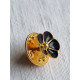 Vintage metal city selskaps pin, sort emalje blomst