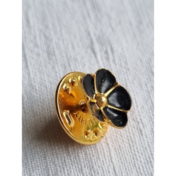Vintage metal city selskaps pin, sort emalje blomst