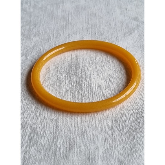 Ubrukt armbånd fra 1980 til 1990-tallet, oker gult