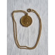 Helt særegent smykke, forgylt One cent fra 1904, gjort om til en medaljong