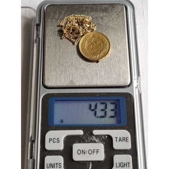 Helt særegent smykke, forgylt One cent fra 1904, gjort om til en medaljong