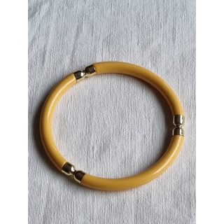 Ubrukt armbånd fra 1980 til 1990-tallet, gult med pynt