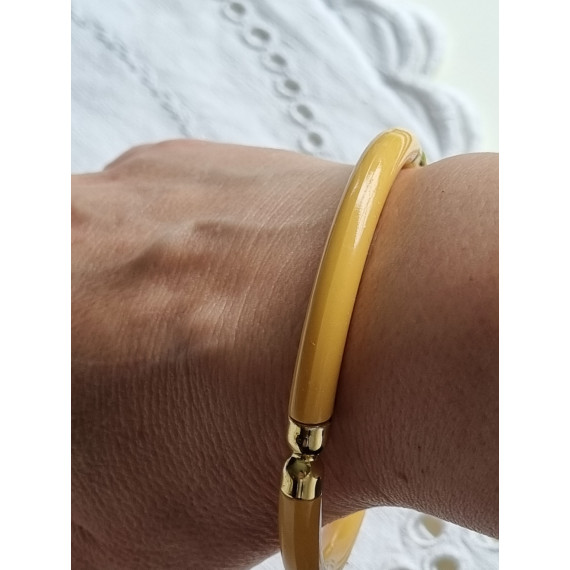 Ubrukt armbånd fra 1980 til 1990-tallet, gult med pynt
