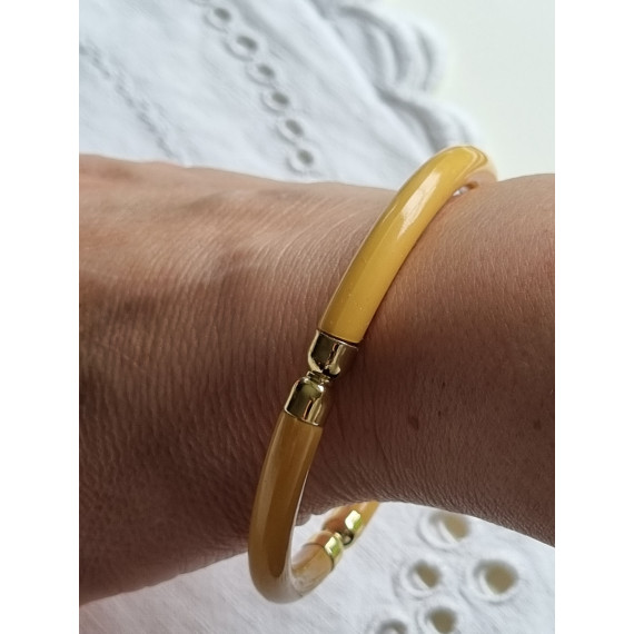 Ubrukt armbånd fra 1980 til 1990-tallet, gult med pynt