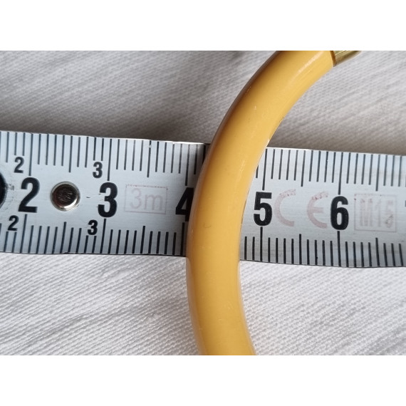 Ubrukt armbånd fra 1980 til 1990-tallet, gult med pynt