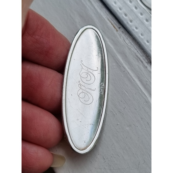Sterling name tag, Navnskilt i sølv, ovalt til å lime på noe, K.H.