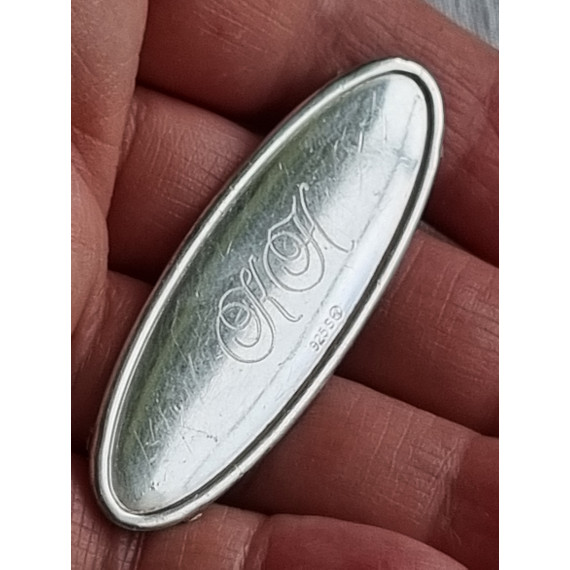 Sterling name tag, Navnskilt i sølv, ovalt til å lime på noe, K.H.