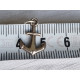 Anheng, charm i sølv, et anker symboliserer håpet