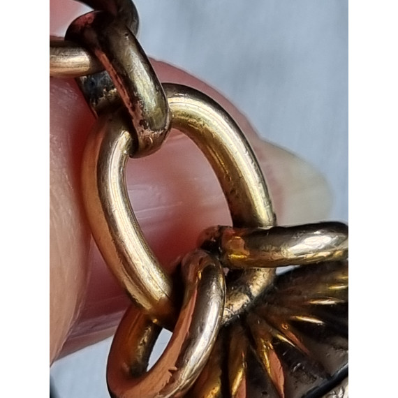Spesiell klokkelenke, med sort bånd, og signet med sort onyx stein
