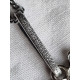Eldre, vakkert smykke fra Thune med sølv ramme i gjennombrutt design